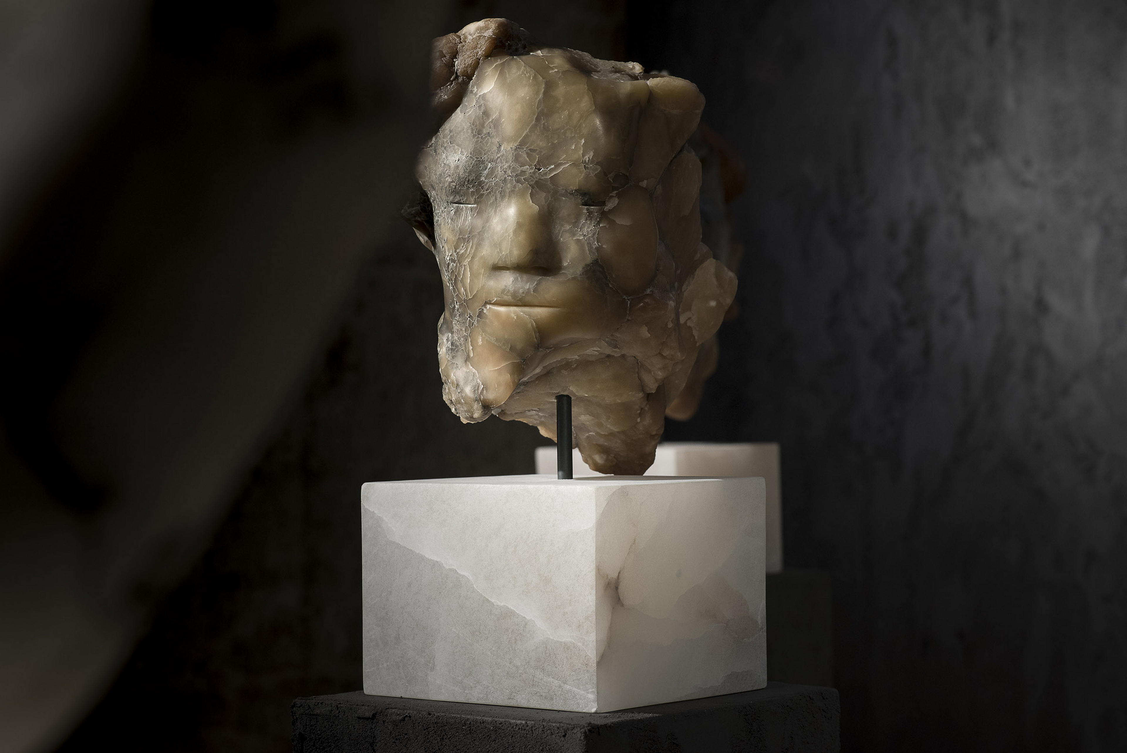 Enlightened Stone exhibition in Volterra, Pisa, by Roberta Busato, made with MultiTerra Smooth Pepe Nero, photo by Simone Stanislai