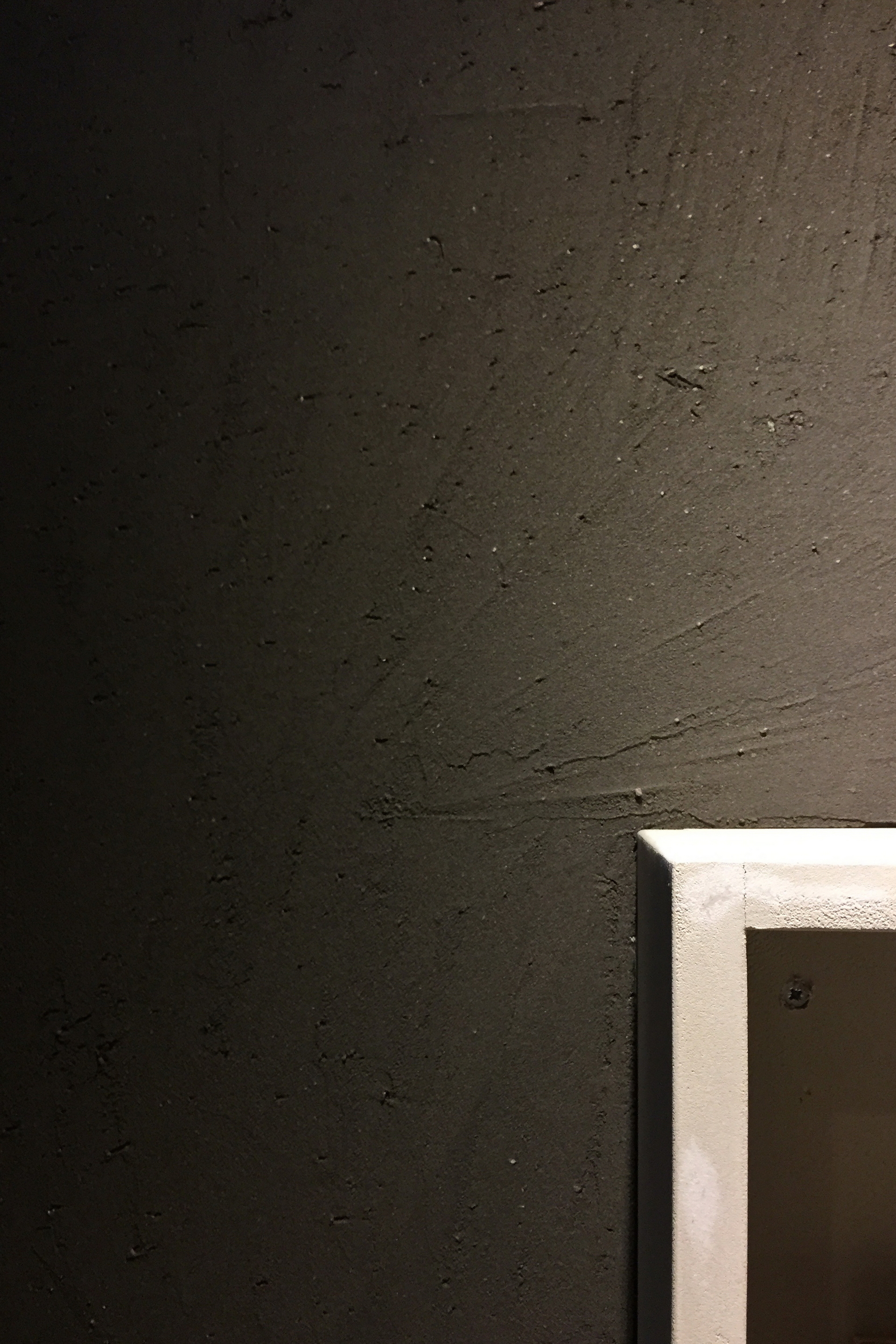 Matteo Brioni stand in ARCHITECT@WORK Kortrijk2015, made with coarse-grained clay finishing plaster MultiTerra Structured Pepe Nero