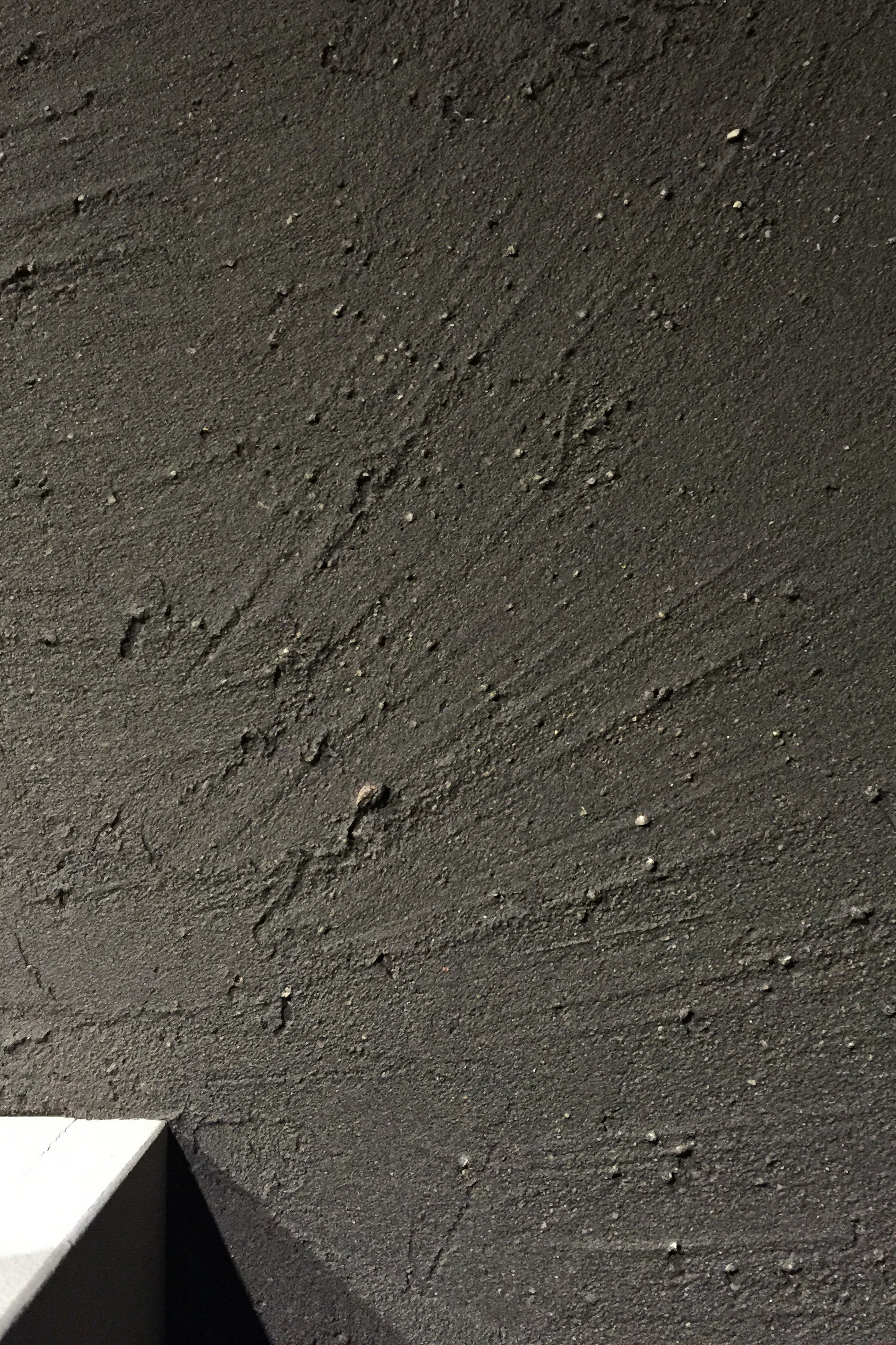 Matteo Brioni stand in ARCHITECT@WORK Kortrijk2015, made with coarse-grained clay finishing plaster MultiTerra Structured Pepe Nero