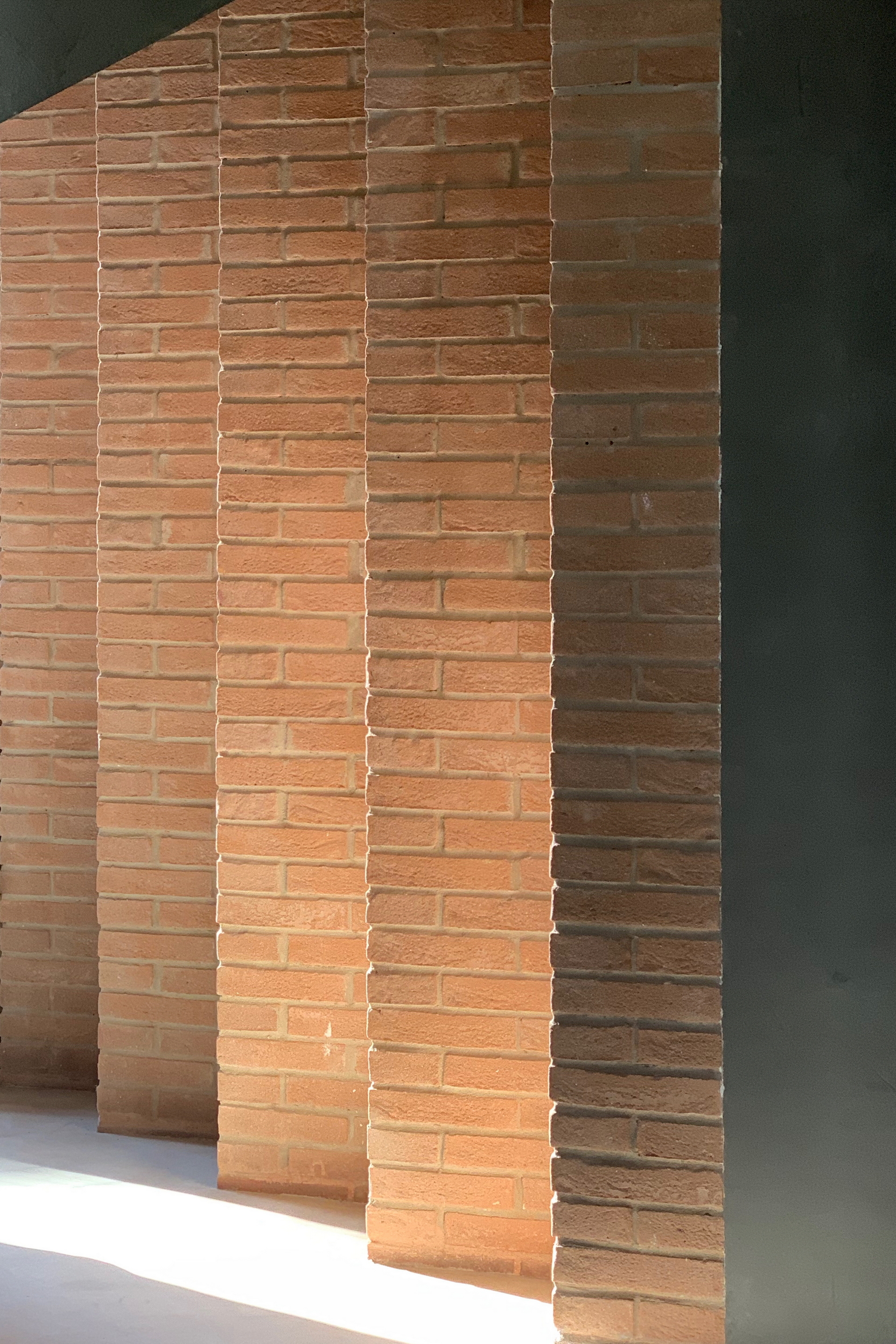 Matteo Brioni headquarter showroom in Ganzaga, Mantua, bricks wall by Lorenzo Carmassi, photo by Matteo Brioni