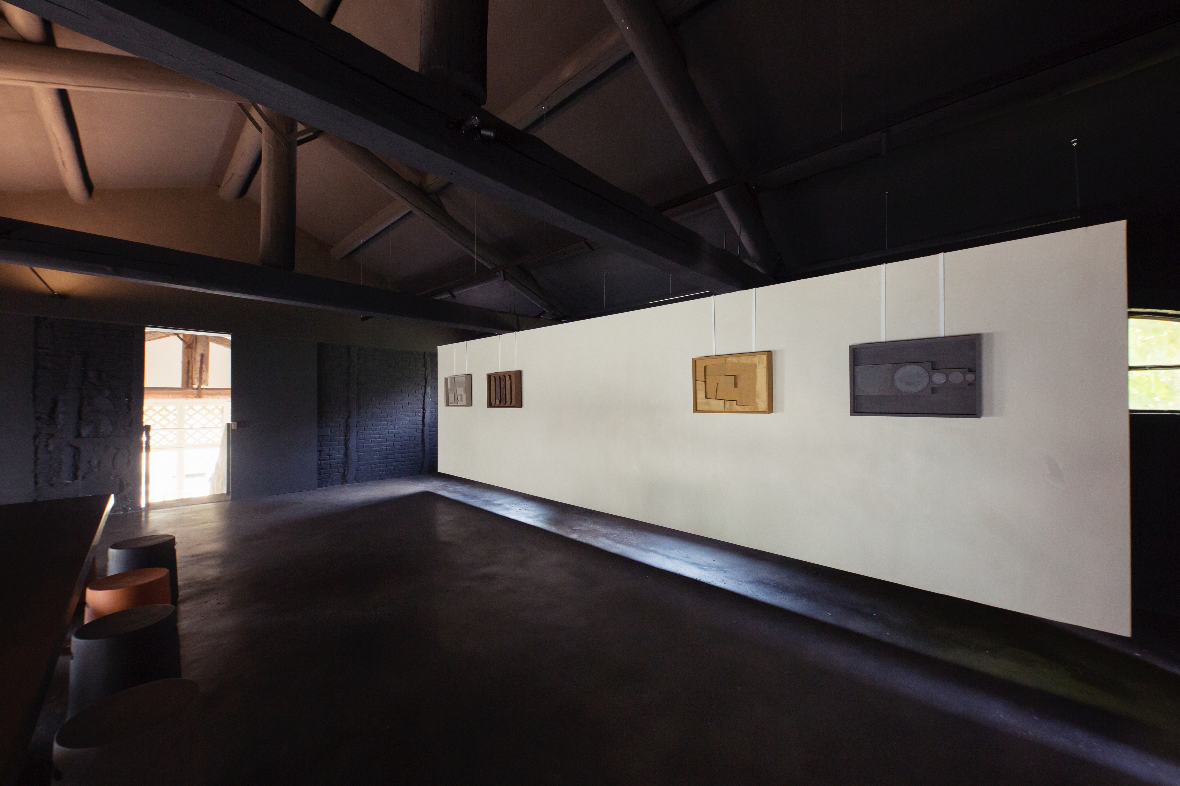 Matteo Brioni headquarter showroom in Ganzaga, Mantua, by Giovanni Bergamaschi, made with TerraTon Floor Wabi Pepe Nero, photo by Giuseppe Gradella