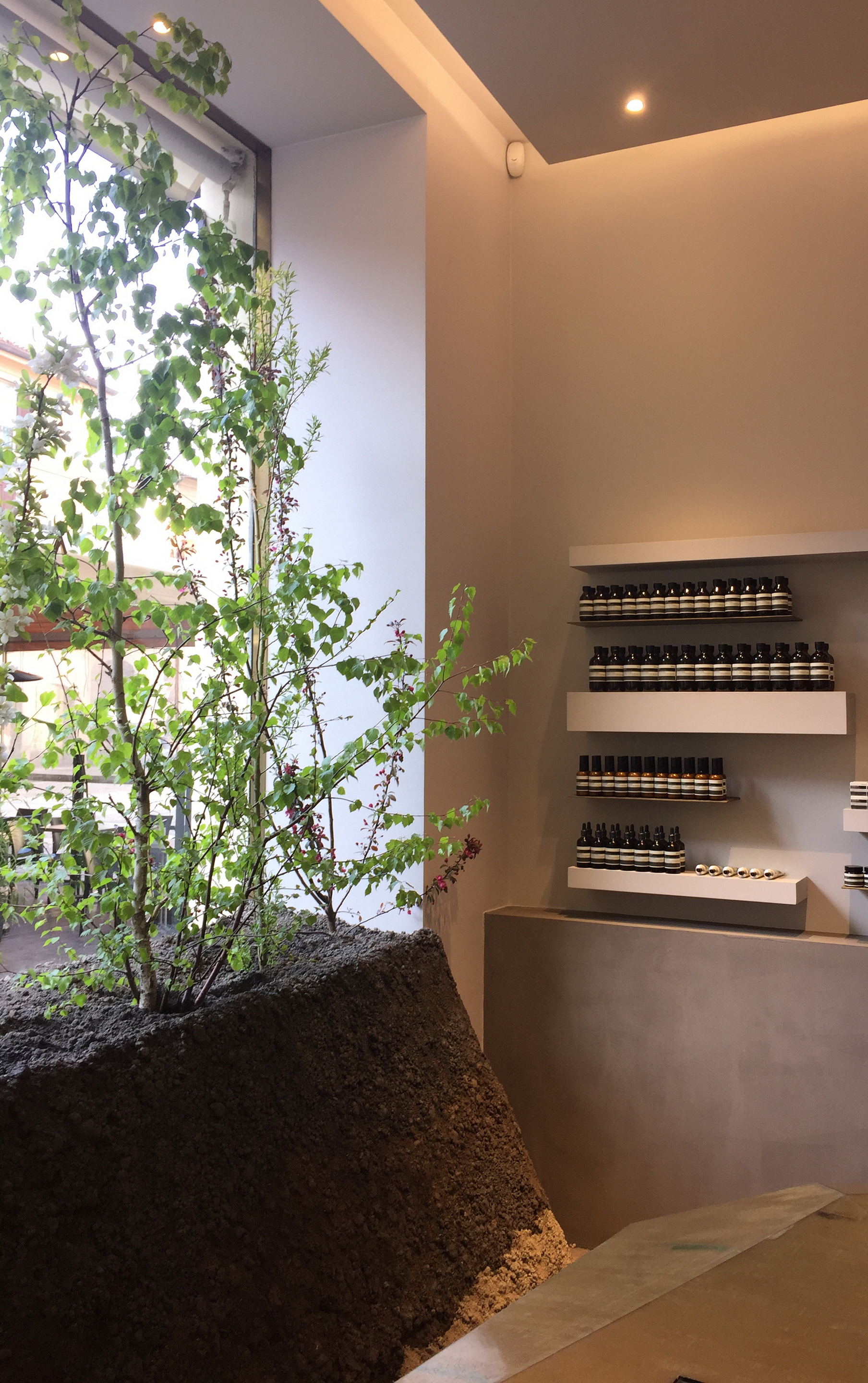 Aesop Brera shop installation during Milan Design Week 2019, by Inside Outside, made with raw earth with different color shades, photo by Trevor Mein et al.