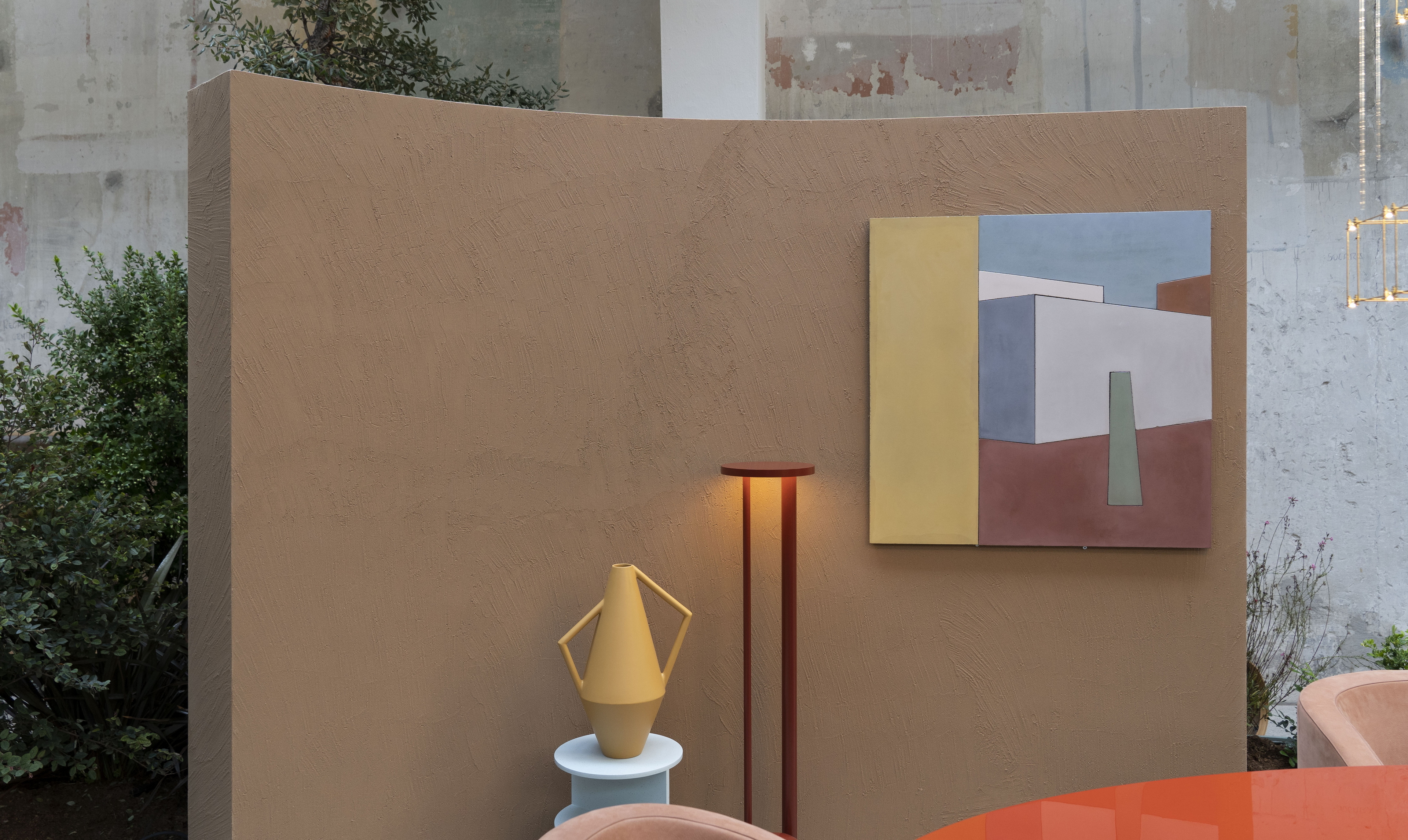 Matteo Brioni's coarse-grained clay finishing wall plaster MultiTerra Smooth for Mollura MOHD showroom in Milan. Project by Studio Pepe