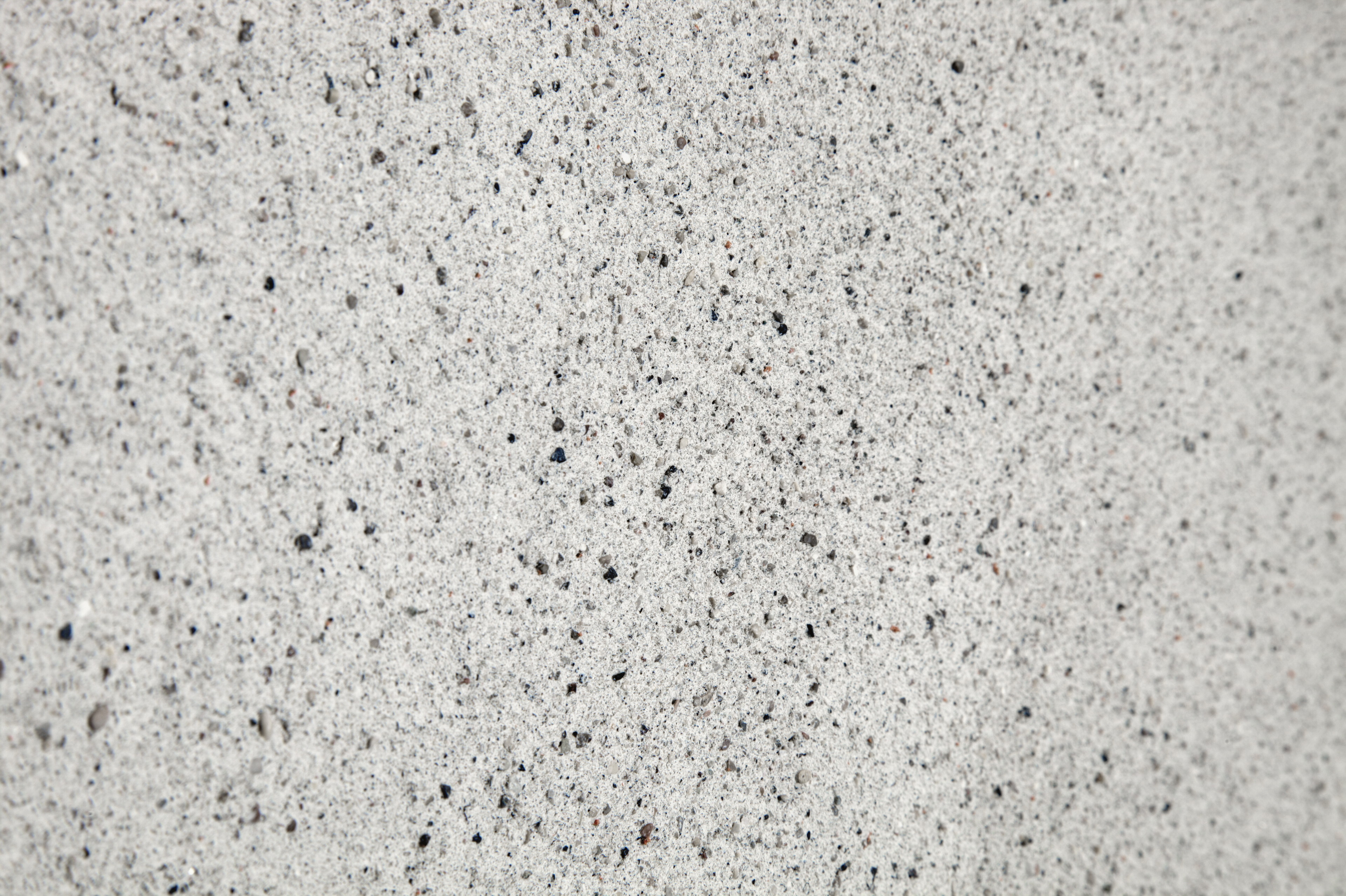 Matteo Brioni's coarse-grained clay plaster MultiTerra Smooth Panna (cream) color installed on walls, ceilings and furnitures in a private house in Brunico by Pedevilla Architects