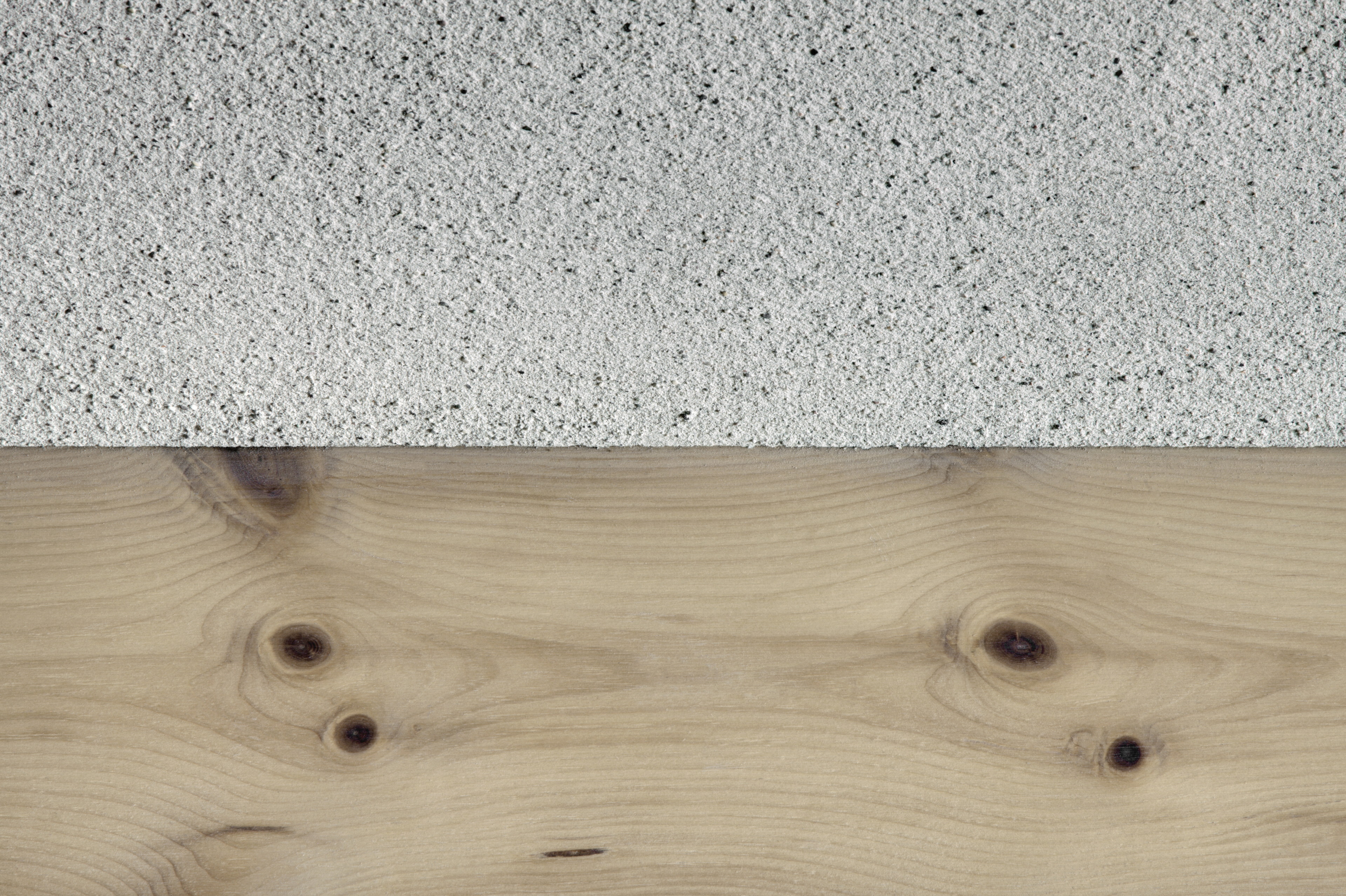 Matteo Brioni's coarse-grained clay plaster MultiTerra Smooth Panna (cream) color installed on walls, ceilings and furnitures in a private house in Brunico by Pedevilla Architects