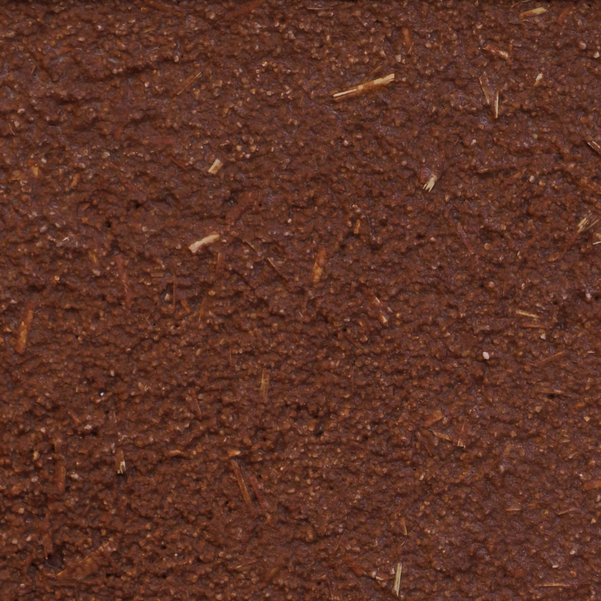 Matteo Brioni's coarse-grained clay plaster MultiTerra Structured Melograno (pomegranade) color with straw as added aggregate in a private house in Milan by Ciro Massaro