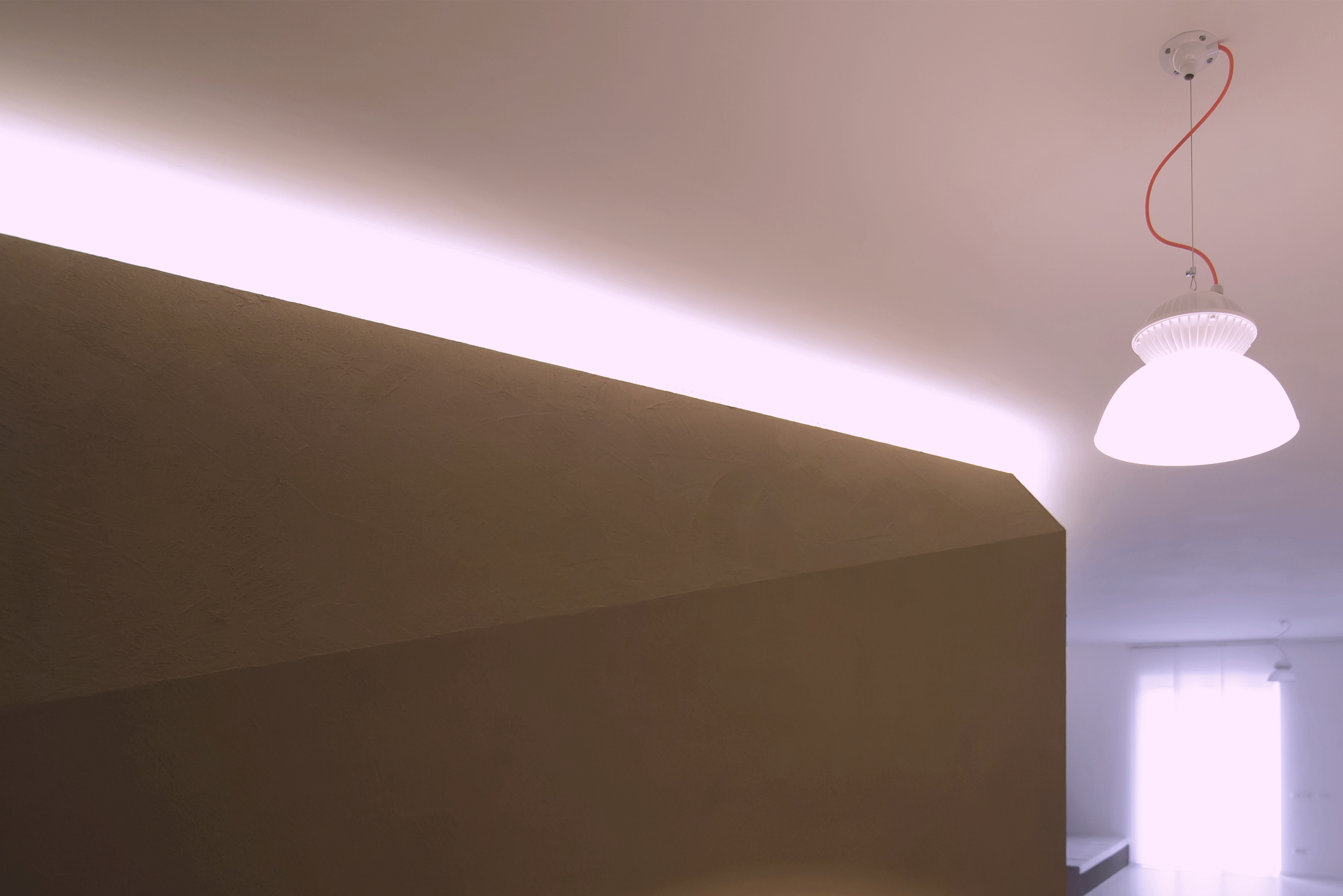 Matteo Brioni's fine-grained clay plaster TerraVista Smooth Cacao color for a private apartment in Turin by R3Architetti, photo by Carlo Mossetti