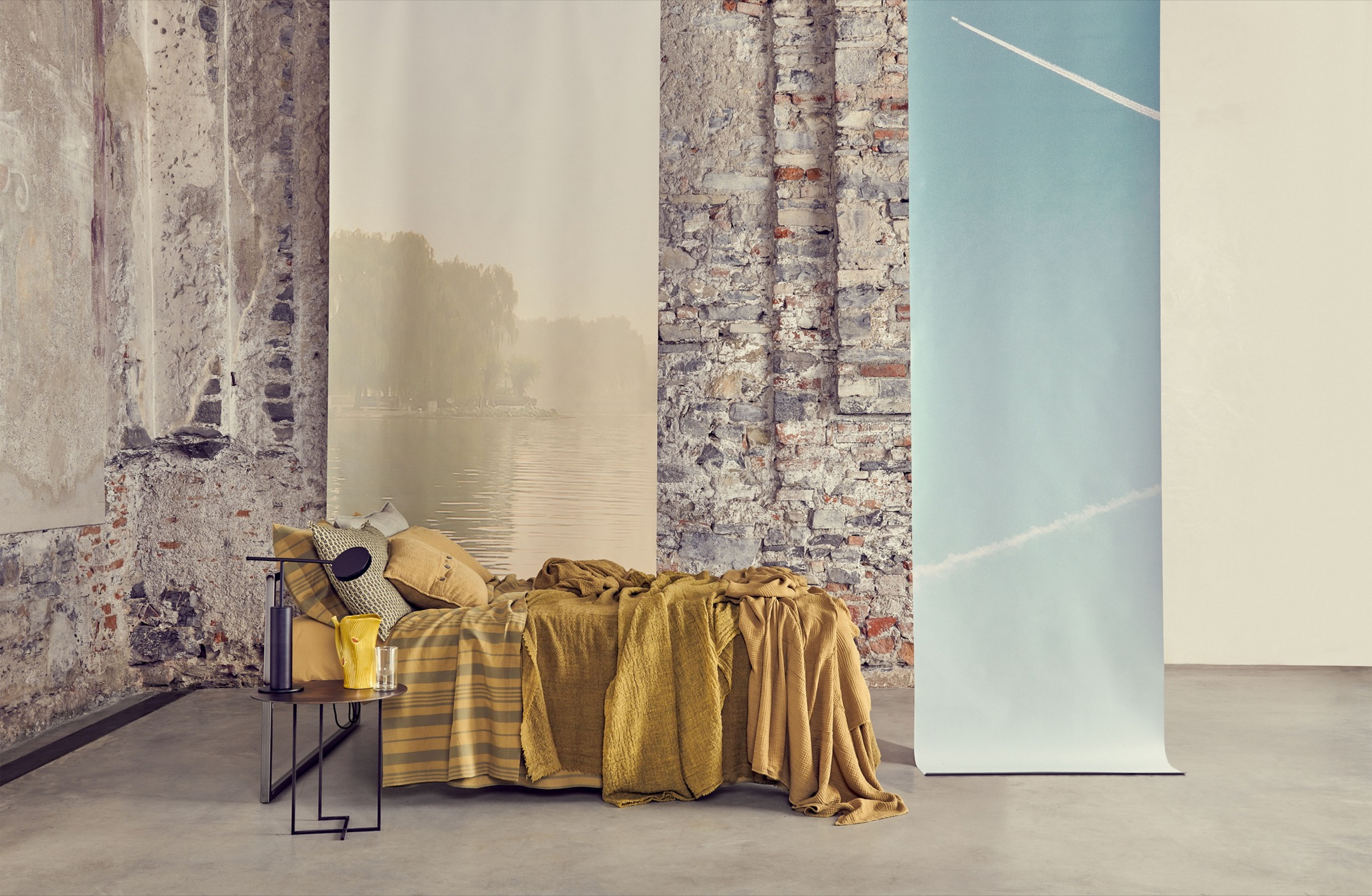 Matteo Brioni's fine-grained clay plaster TerraVista Smooth Panna (cream) color for Society Limonta ADV 2017