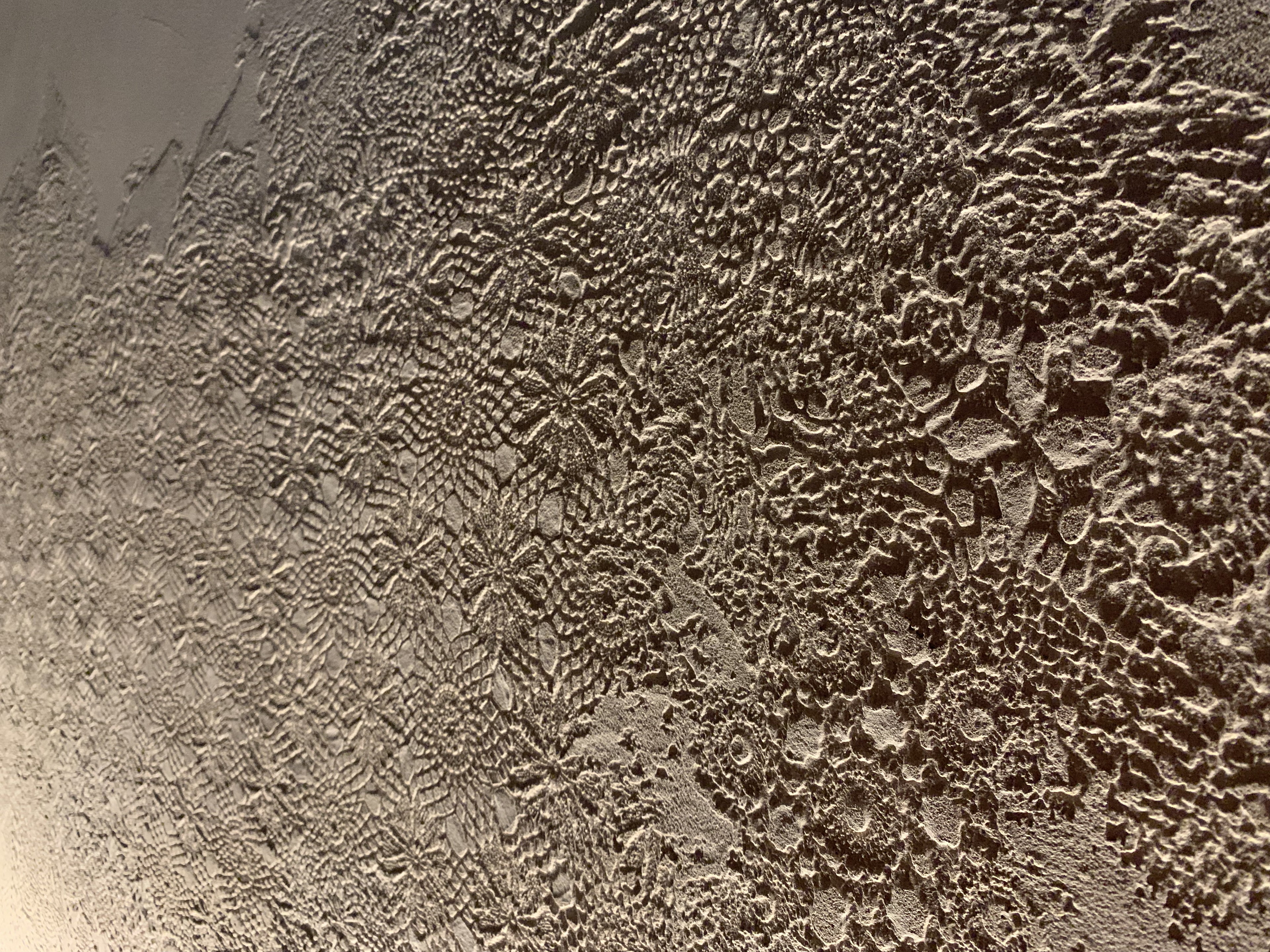Matteo Brioni's textured clay plaster TerraEvoca 2 Layers Cipria (powder color) applied on walls in a private apartment in Verona, project by Emanuele Soldi