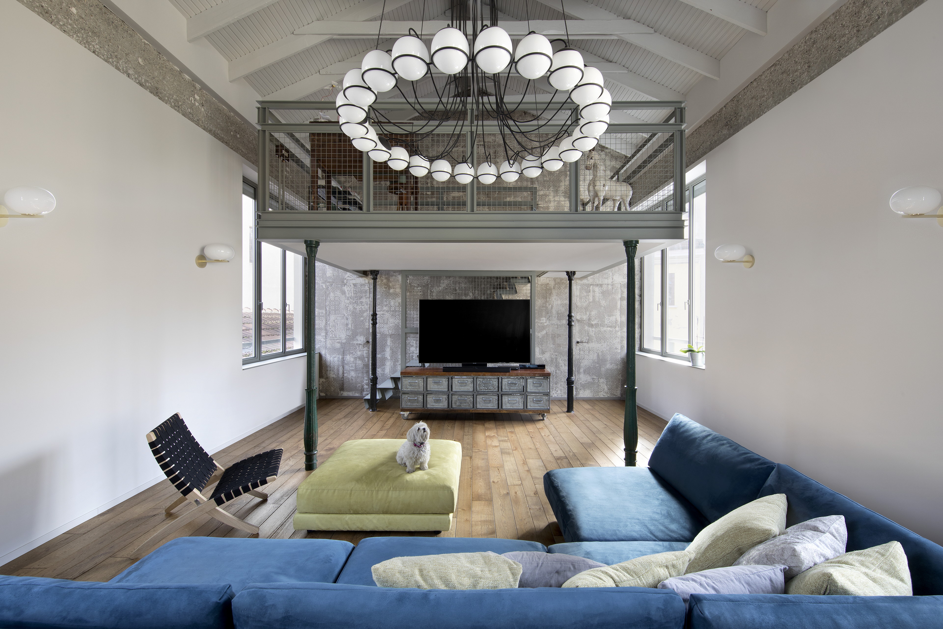 Matteo Brioni's textured clay plaster TerraEvoca 4 Layers Sale Grigio (gray salt) color appllied on walls and doors in a private house in Milan, project by NM Architetti, photo by Barbara Corsico