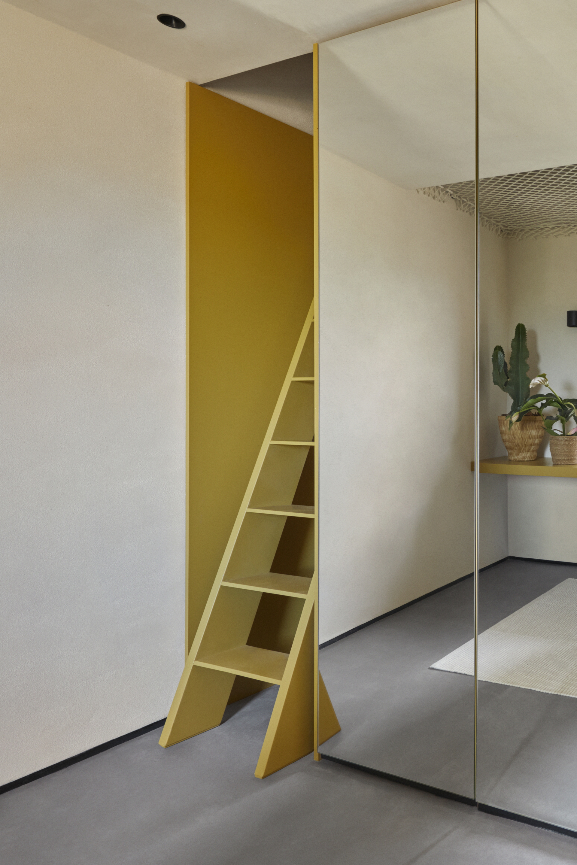 Matteo Brioni's mineral coating TerraFloor Smooth Sale Grigio (gray salt) color on floors for Airbnb 1 Euro House in Sambuca di Sicilia by Studio Didea, photo by Claudia Zalla