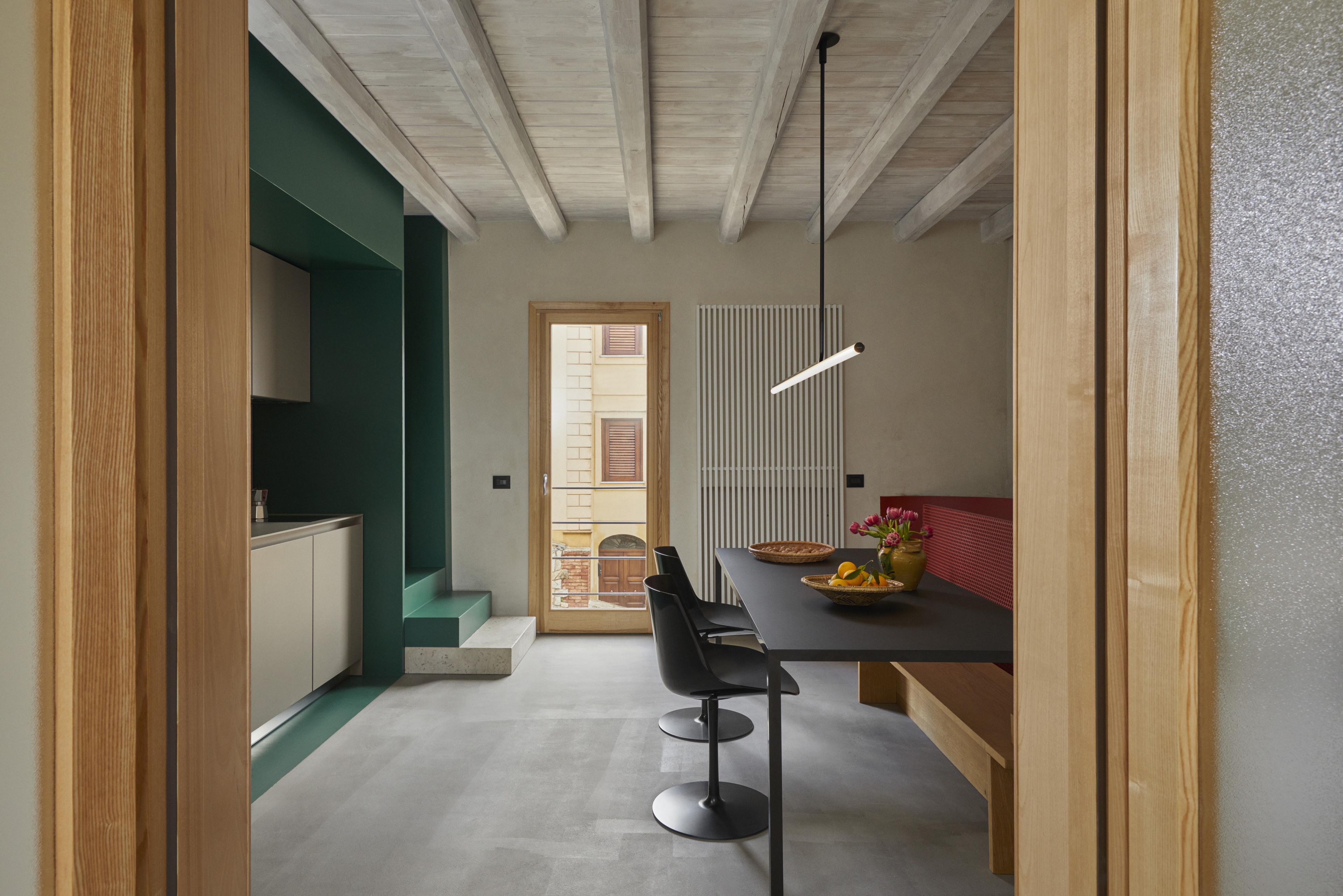 Matteo Brioni's mineral coating TerraFloor Smooth Sale Grigio (gray salt) color on floors for Airbnb 1 Euro House in Sambuca di Sicilia by Studio Didea, photo by Claudia Zalla