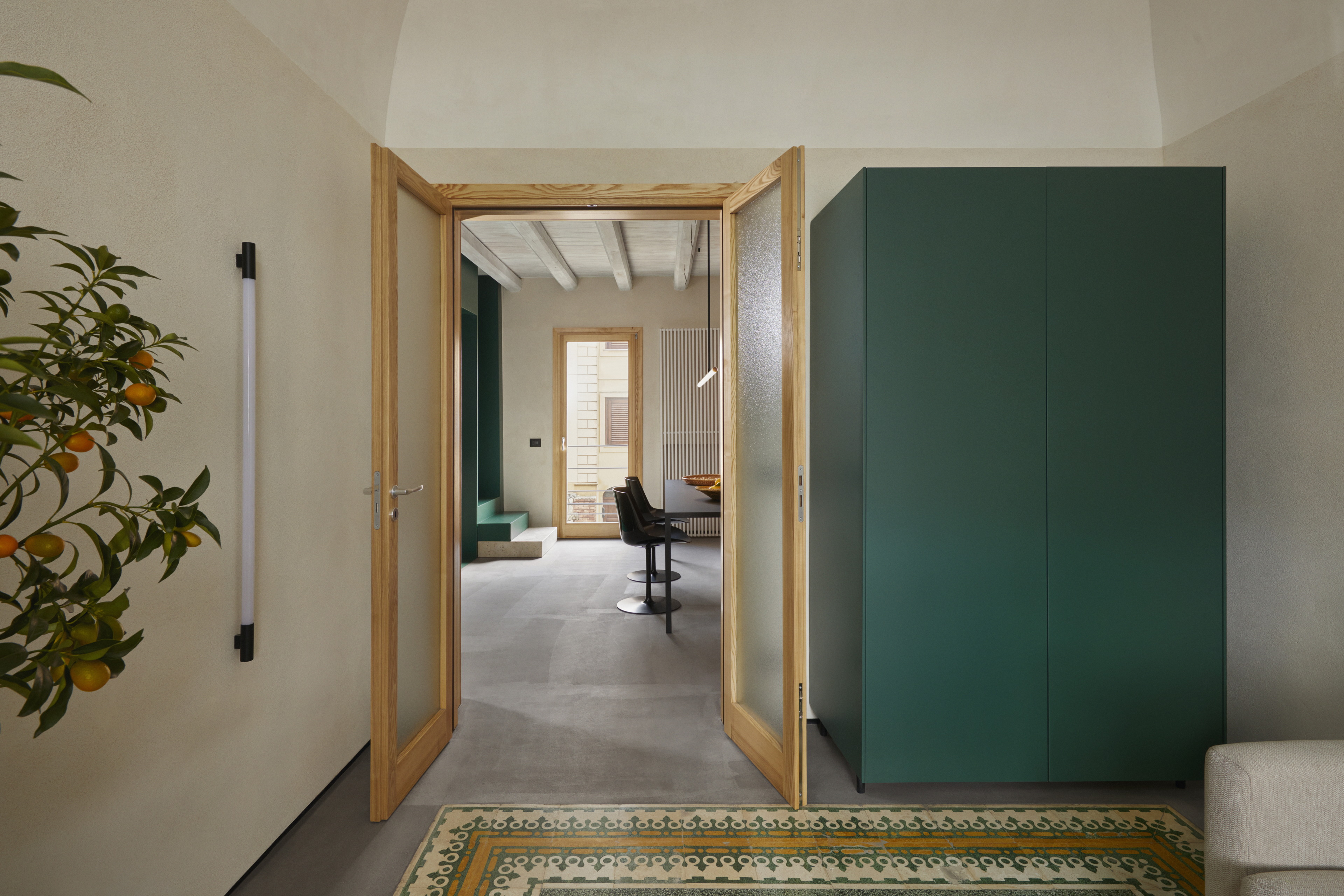 Matteo Brioni's mineral coating TerraFloor Smooth Sale Grigio (gray salt) color on floors for Airbnb 1 Euro House in Sambuca di Sicilia by Studio Didea, photo by Claudia Zalla