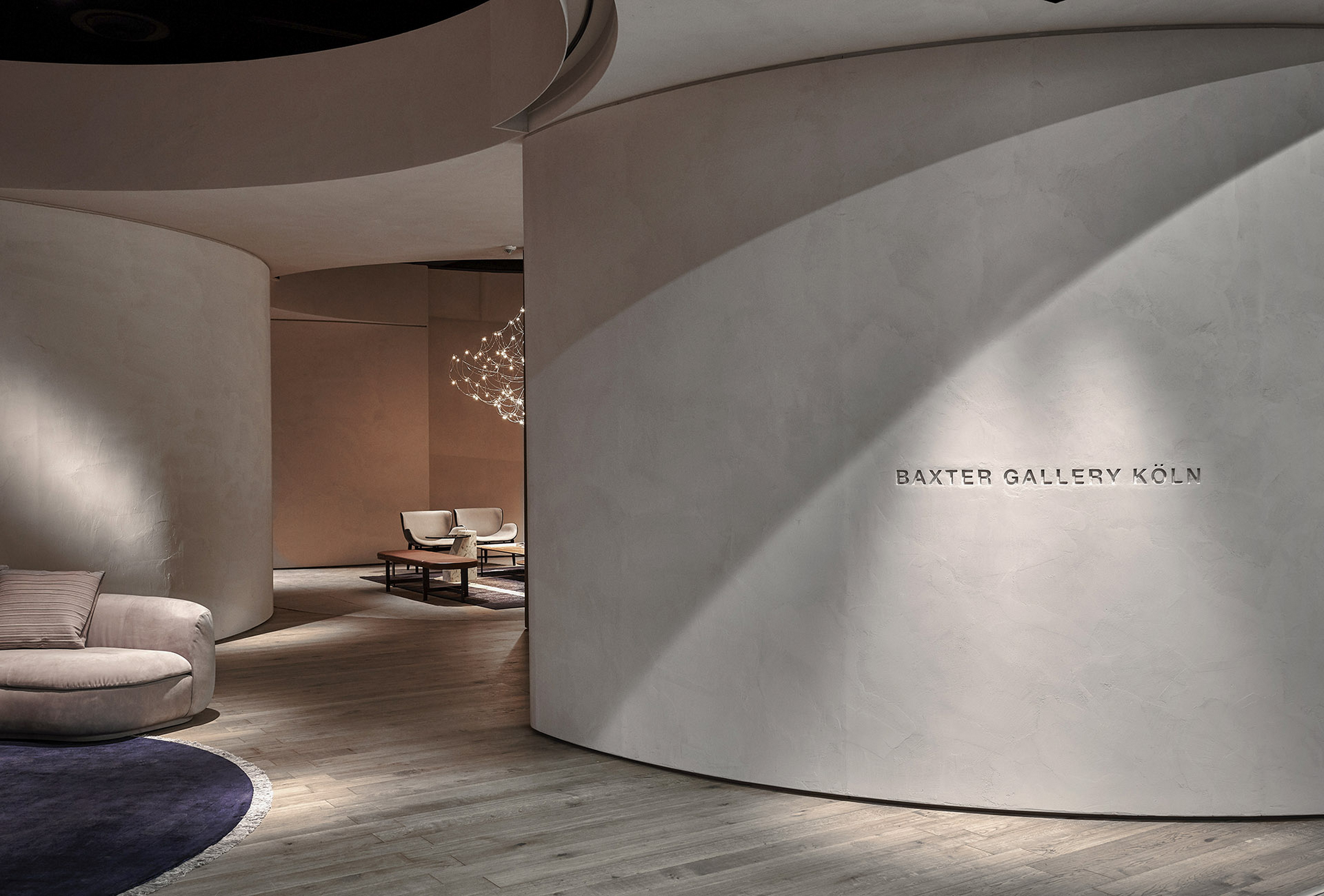 Natural clay paint TerraSilk Structured Sale Grigio (gray salt) and bespoke Pece colors by Matteo Brioni for Baxter stand surfaces at imm Cologne 2020. Design by Baxter, photo by James Stokes courtesy of Baxter