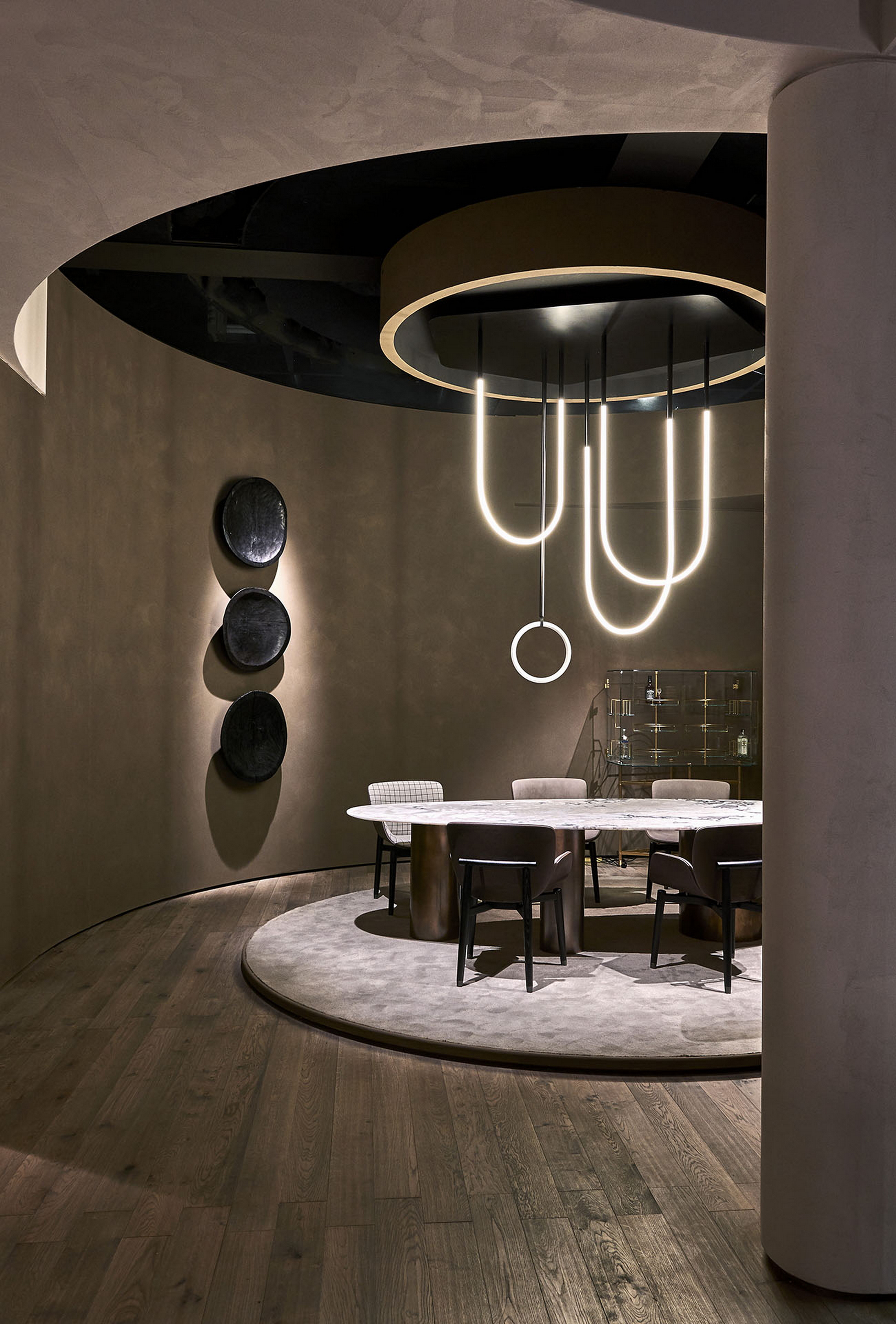 Natural clay paint TerraSilk Structured Sale Grigio (gray salt) and bespoke Pece colors by Matteo Brioni for Baxter stand surfaces at imm Cologne 2020. Design by Baxter, photo by James Stokes courtesy of Baxter