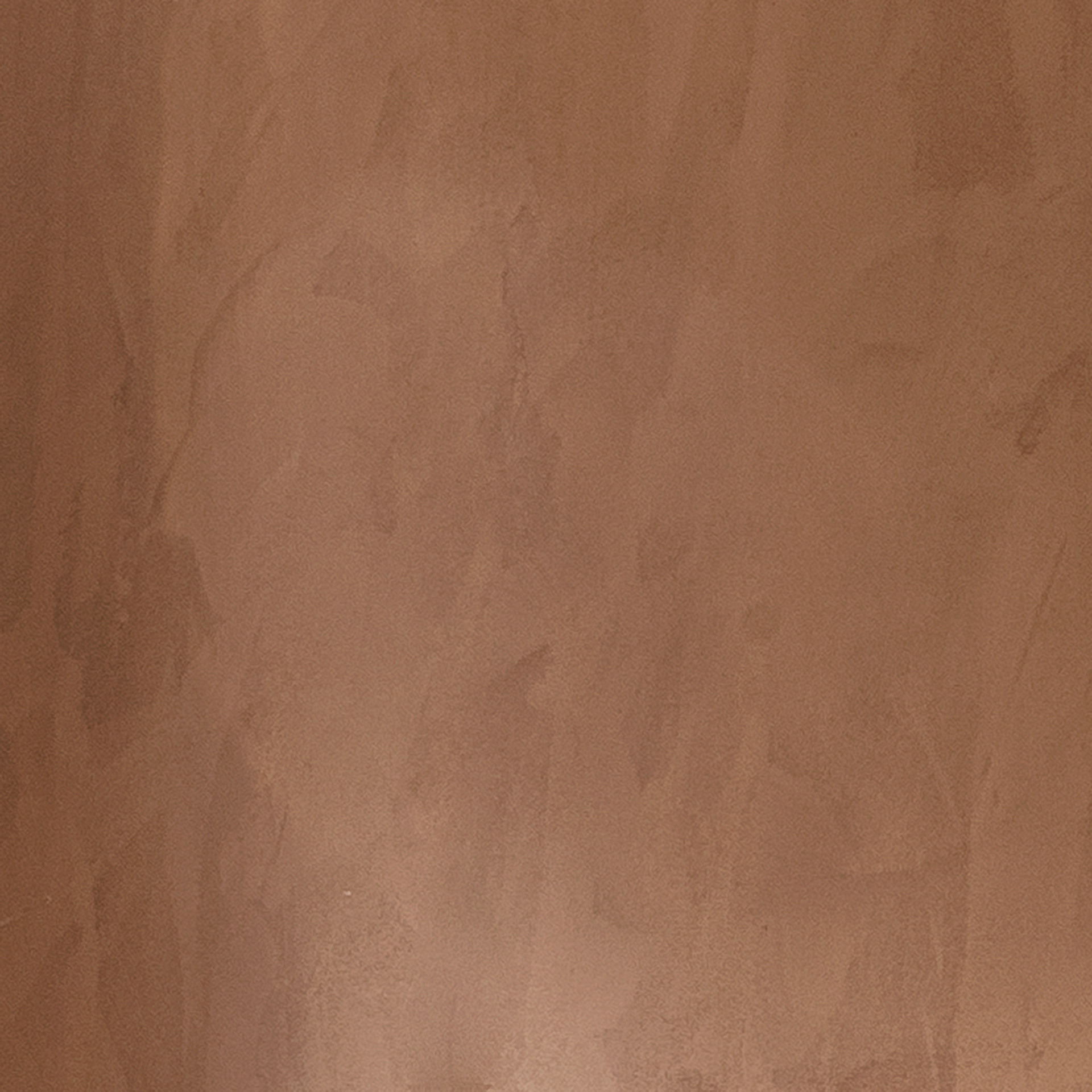 TerraSilk Structured natural clay paint in the bespoke Wenge (dark brown) color for Baxter's Home collection at the Milan Furniture Fair. Photography: courtesy of Baxter