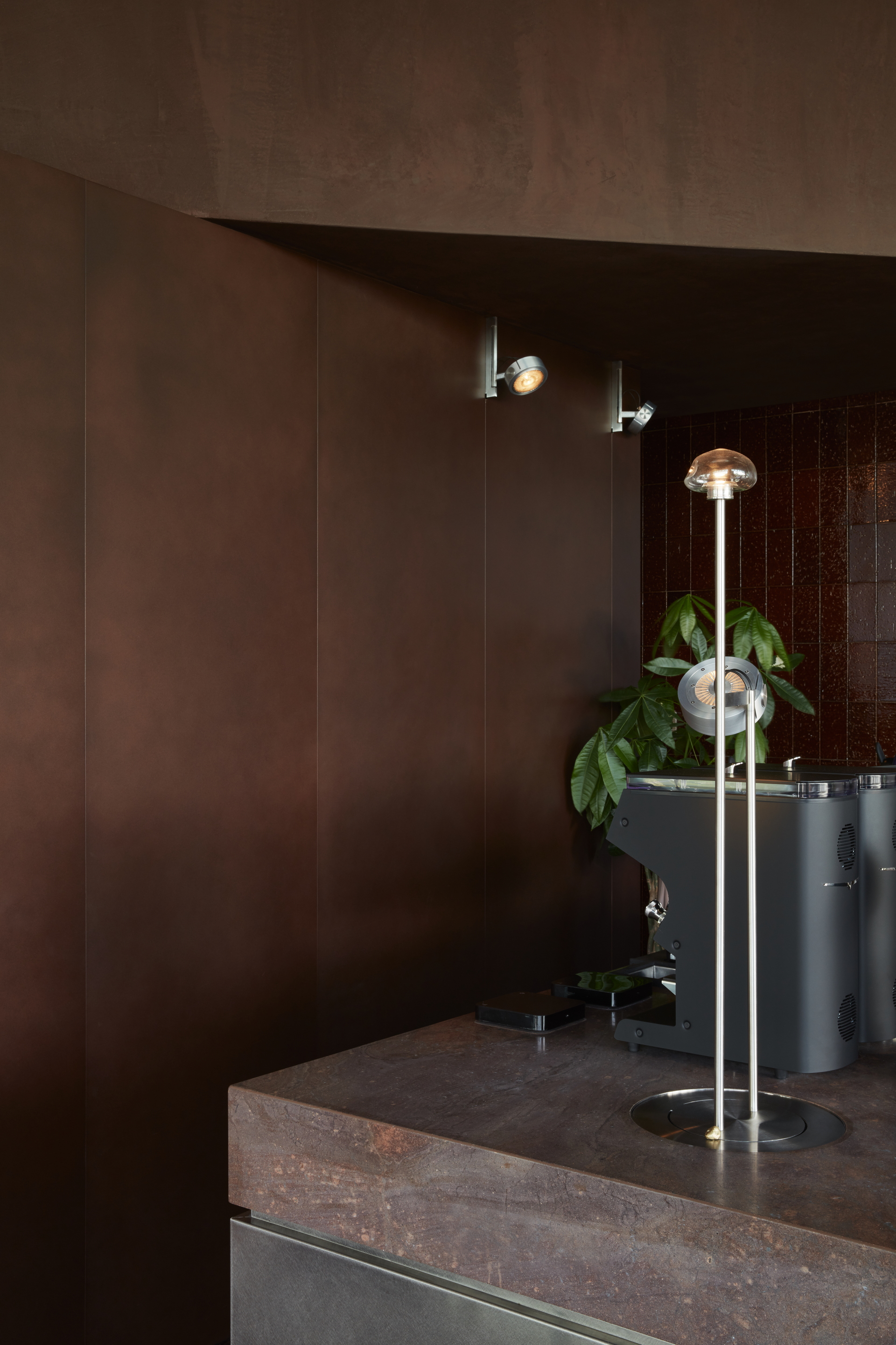 Clay and lime tadelakt finishing plaster TerraCalix Smooth custom color (Deep Maroon) for Terra Al Qana restaurant in Abu Dhabi. Project by Bone Studio