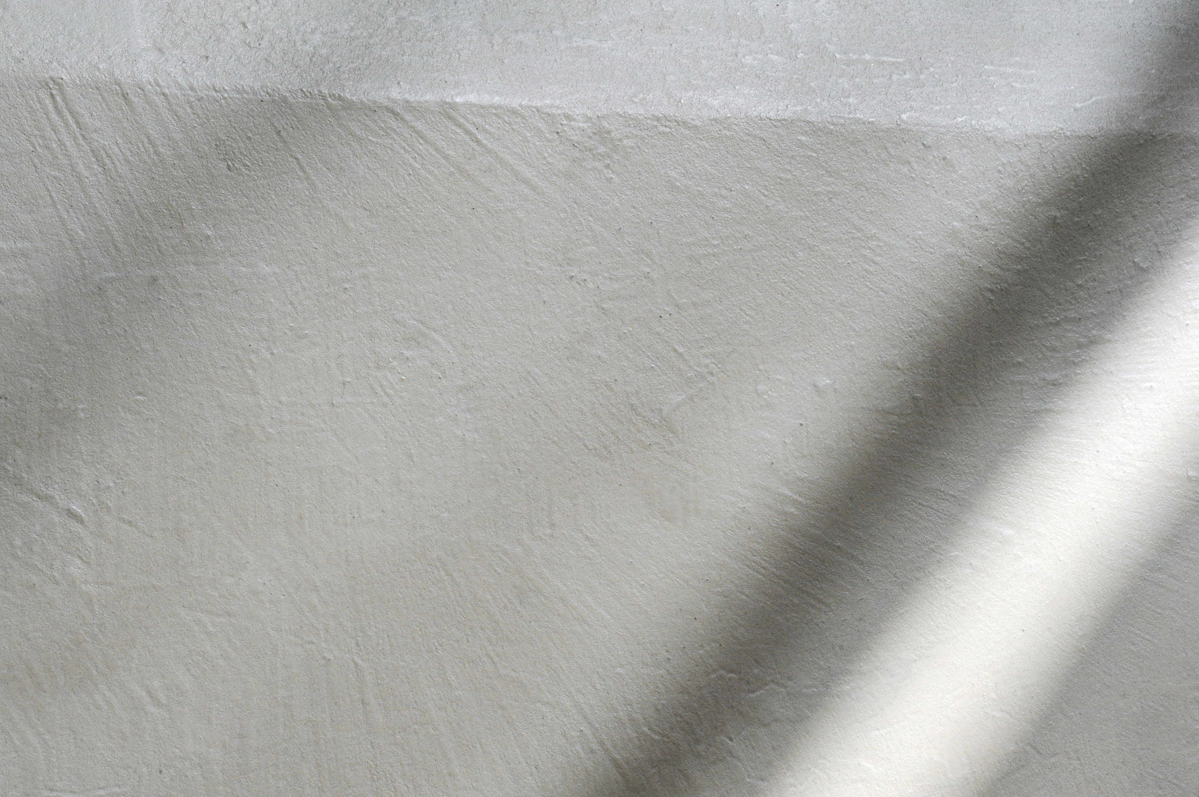 Natural clay finishes for the MATTEOBRIONI stand at CERSAIE 2023 in Bologna. Fine-grained mixture of clays and mineral binders TerraTon Floor applied on floors. Design by Studio irvine. Photography Lorenzo Carmassi