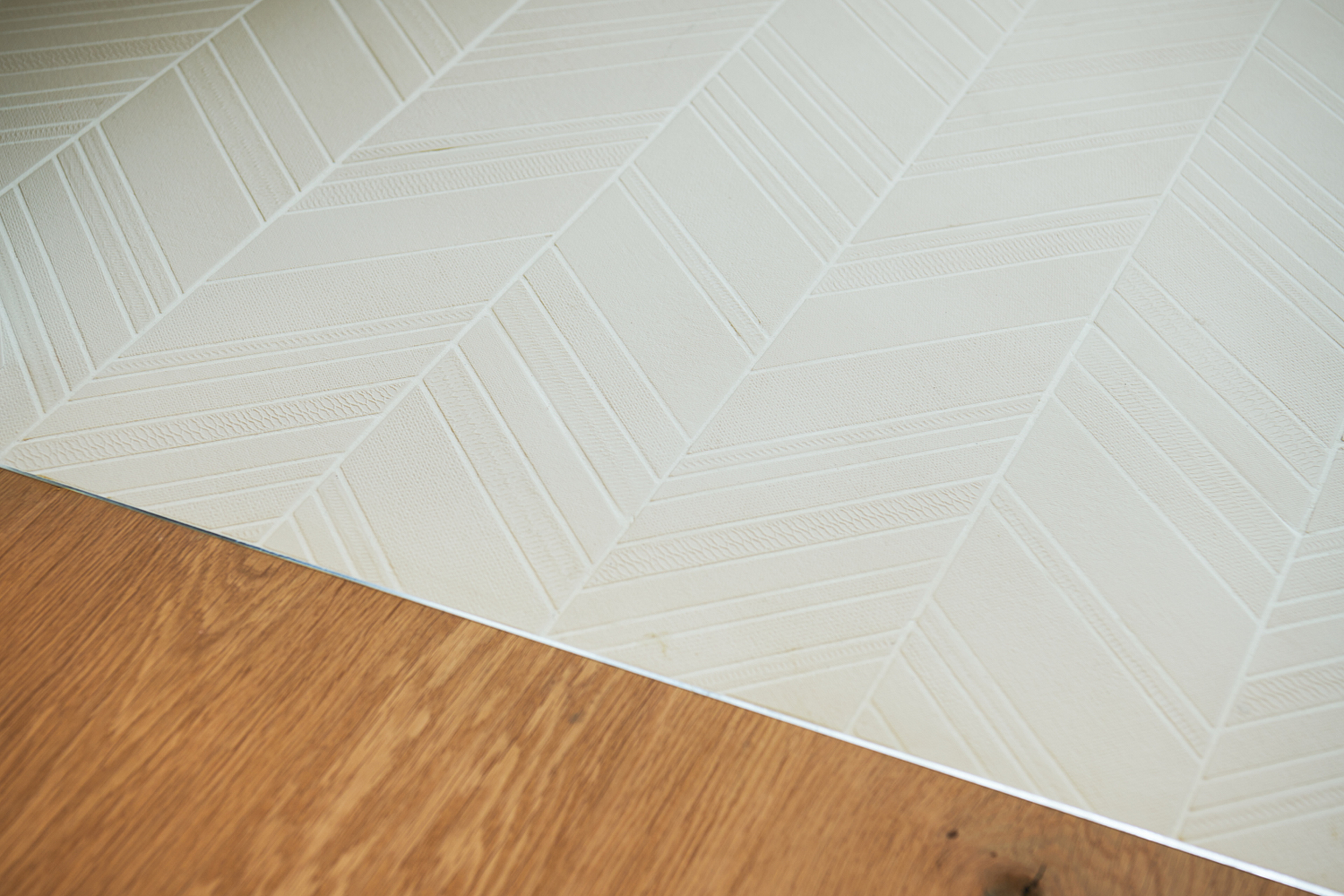 TerraVista Smooth Cannella (cinnamon color) fine-grained clay finishing plaster applied to shelves, containers and sliding panels for an interior architecture in Milan by Studio Irvine. Photography by Natalia Garcia