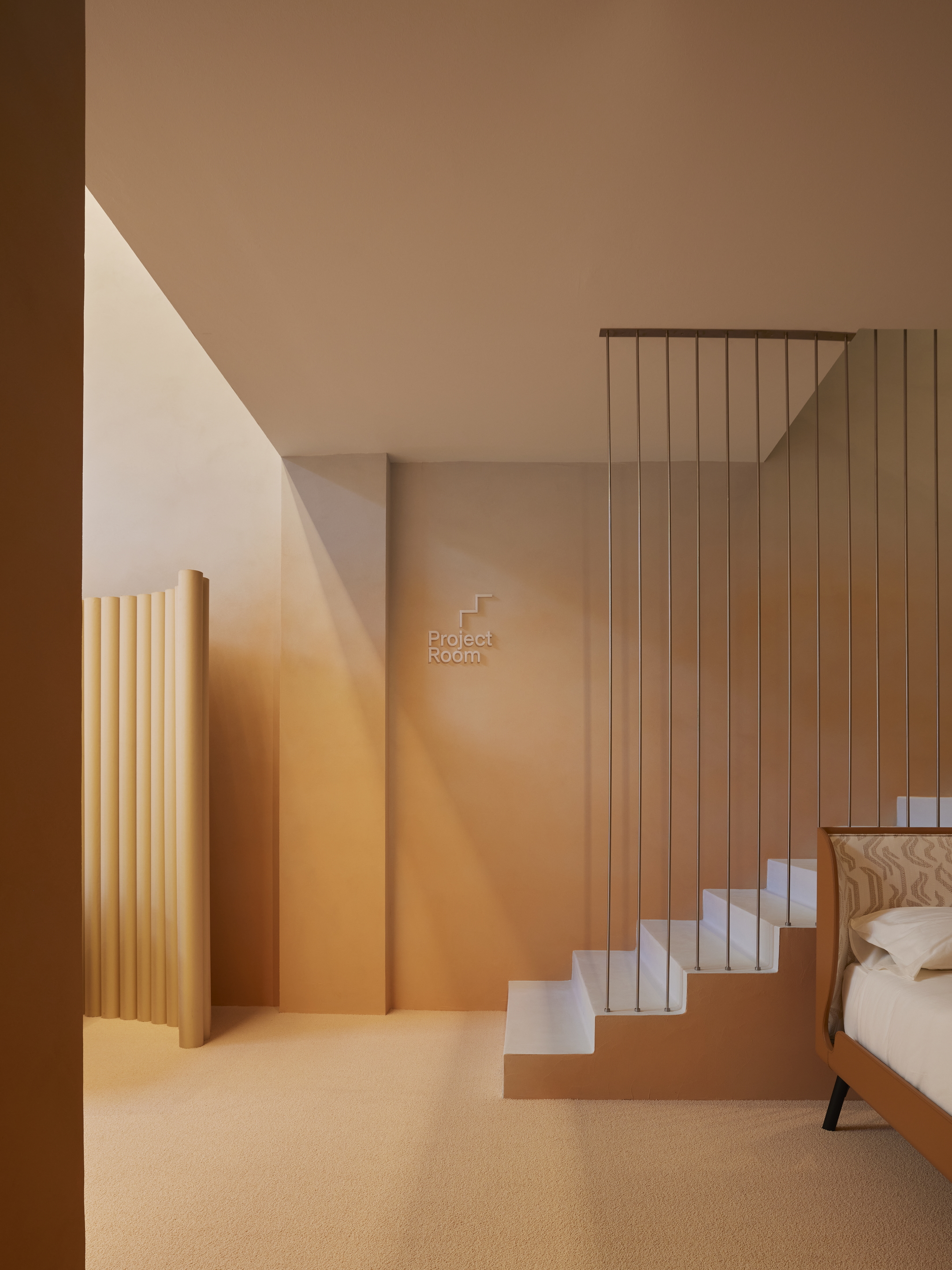 TerraSilk Smooth  clay paint and TerraVista Plus Smooth reinforced raw earth finishing plaster, both custom color, for the BolzanSpace showroom in Milan. Project by Zanellato/Bortotto, Photography by Omar Sartor