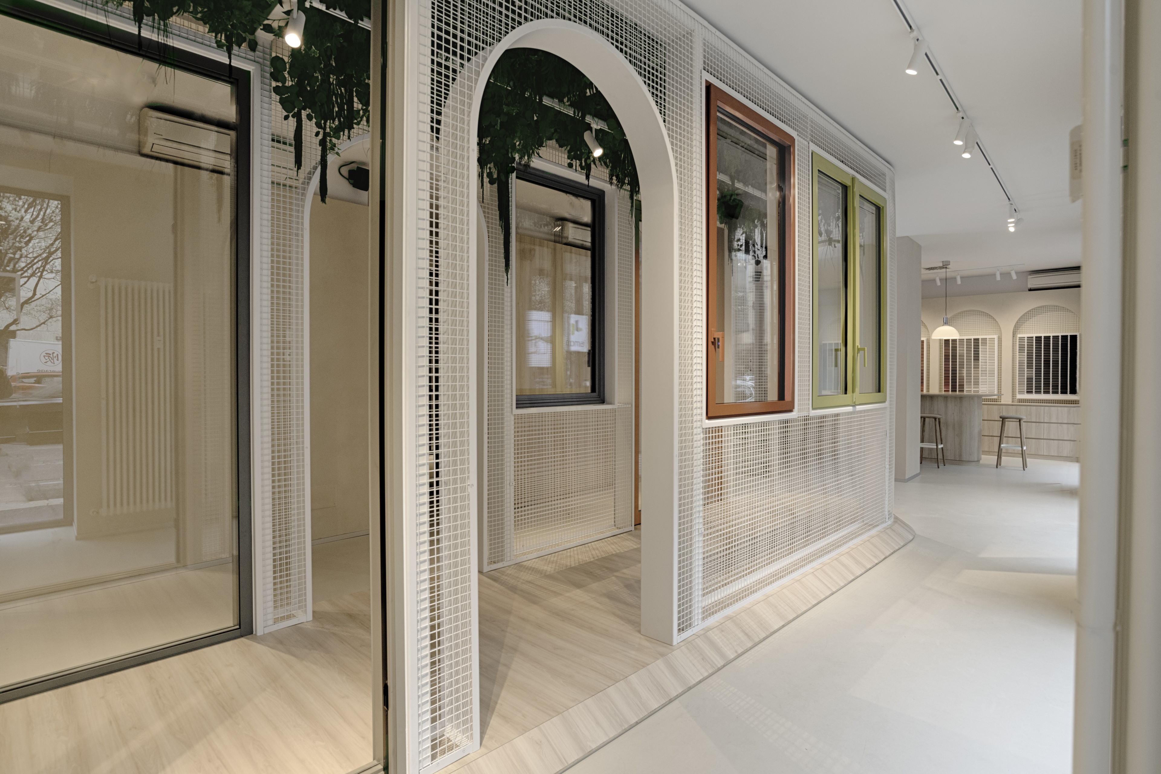 Natural clay plaster TerraVista Smooth Panna for the showroom Spazio Domal - Wicona Italia, Milan. Project by LasciaLaScia Architecture, Photography by courtesy of Hydro Building Systems Italy SpA