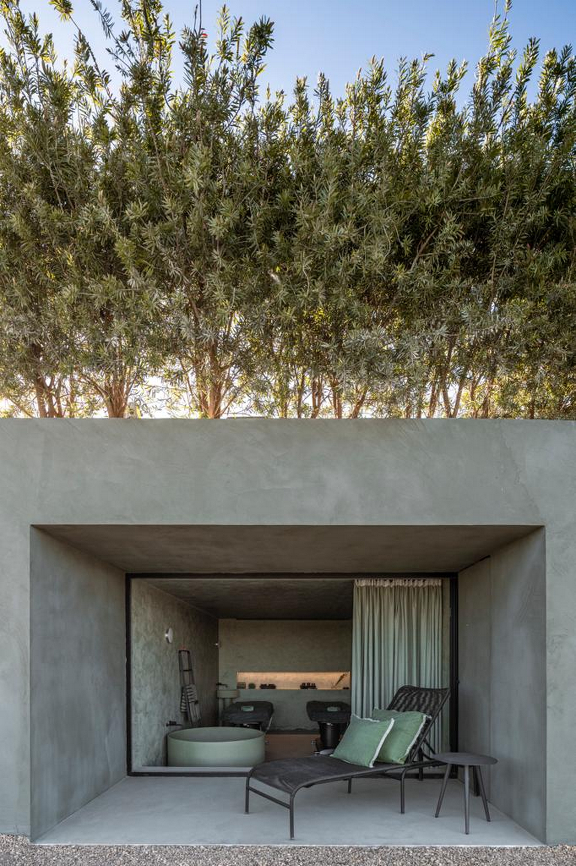 Clay plaster for a SPA designed by Manuel Aires Mateus in Alentejo. TerraTon Wall finishing plaster made from natural pozzolan clay, cement and fine-grained mineral binders applied to the exterior surfaces. Photo: João Guimarães