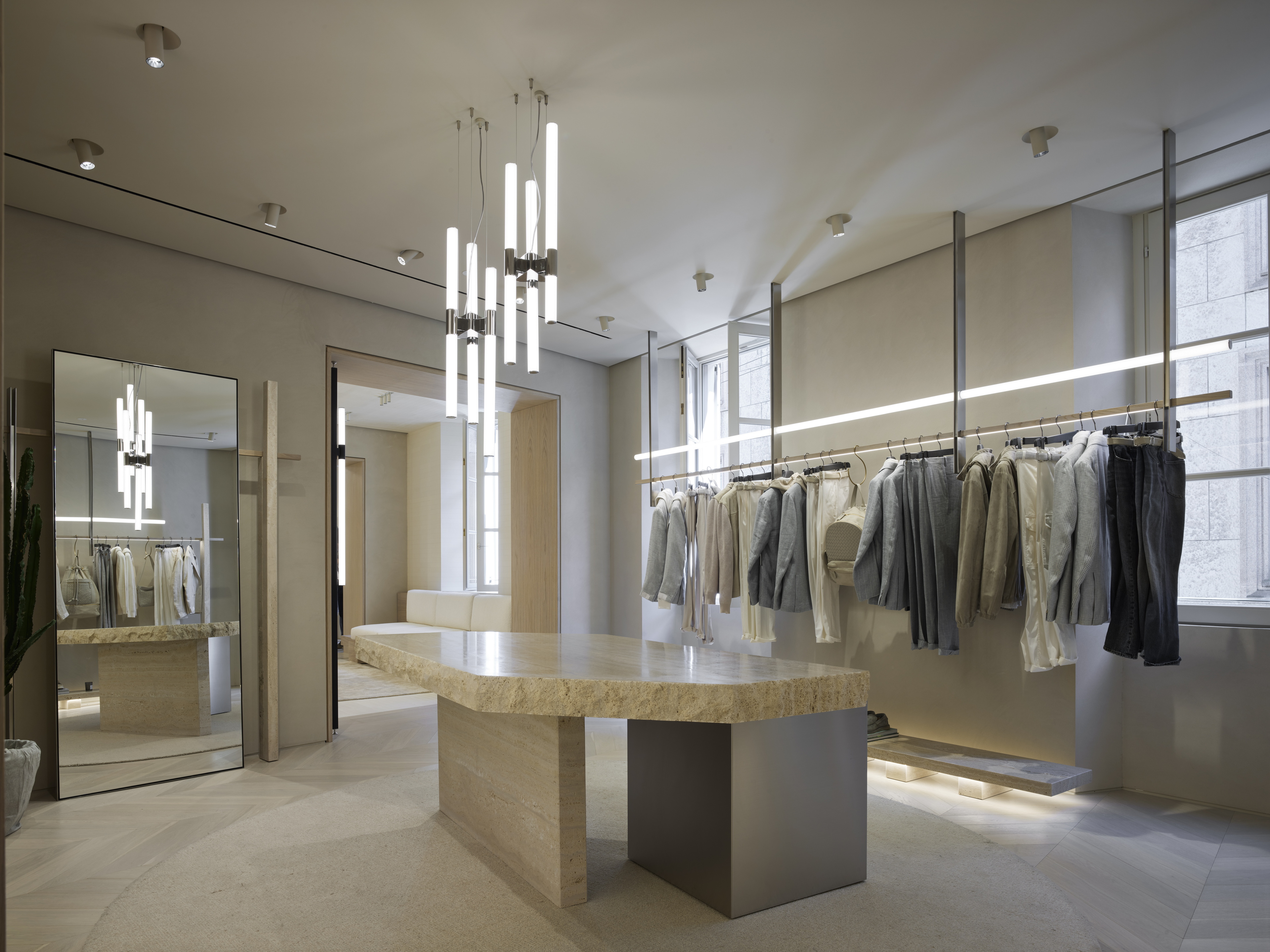 Reinforced clay finishing plaster TerraVista Plus Smooth Panna (cream) colour applied to the walls of Eleventy's Milan flagship store. Project by Parisotto+Formenton Photography: Pietro Savorelli